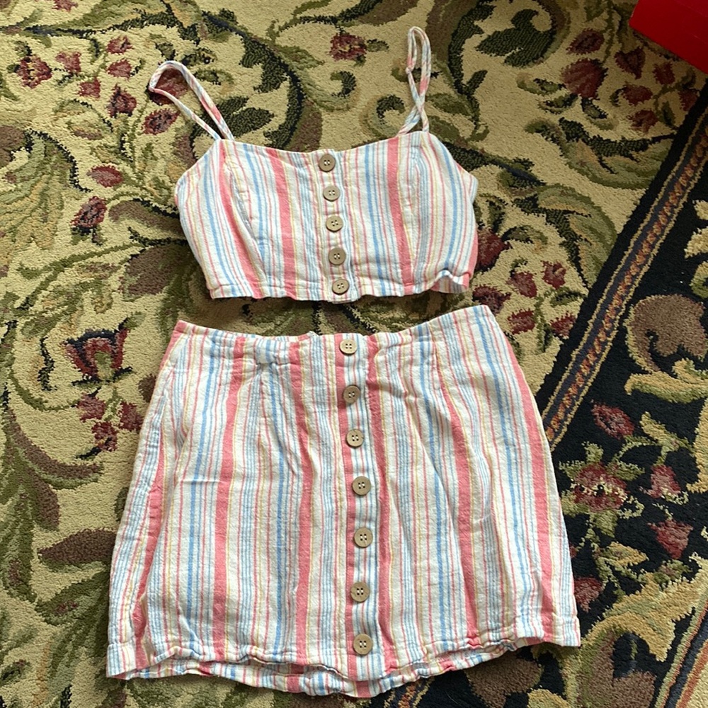 Two piece set. Strips with buttons